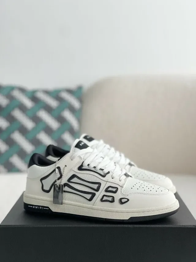 Amiri Skel Top Low Sneakers "White/Black" - image