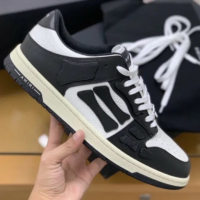 Amiri Skel Top Low Sneakers "Black/White" - image